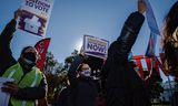 Een demonstratie tegen discriminerende maatregelen bij de verkiezingen in de buurt van  het Witte Huis in Washington, in november dit jaar.