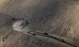 An excavator and tipping cars in a daily mine in the Central-Ukrainian city of Kryvy Rih, at the end of April. 