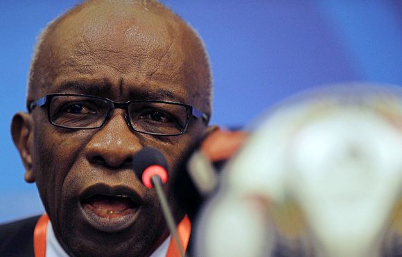 Caption: A file photo taken on September 23, 2009 show FIFA vice-president Jack Warner during a press conference in Cairo. FIFA vice-president Jack Warner, the central figure in recent bribery allegations, has resigned from his post, world football's governing body confirmed on June 20, 2011. AFP PHOTO / CRIS BOURONCLE
