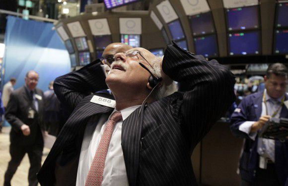 on the floor of the New York Stock Exchange Wednesday, Aug. 10, 2011. (AP Photo/Richard Drew)
