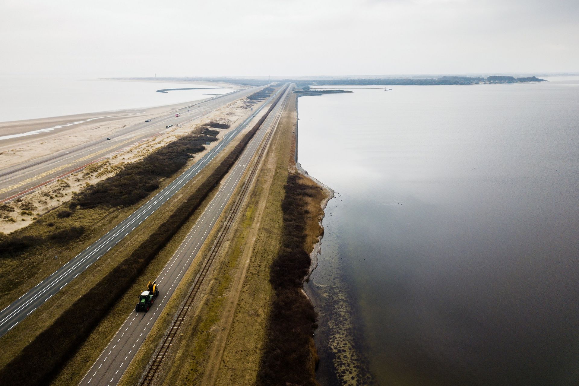 Opinie | De vraag is niet óf Nederland onder water verdwijnt, maar