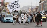 Een demonstratie in Kandahar, Afghanistan, om te vieren dat de Taliban een jaar aan de macht is.