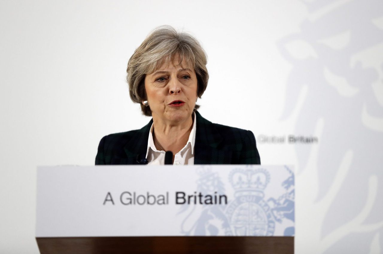 De Britse premier Theresa May dinsdag tijdens haar speech in Londen.