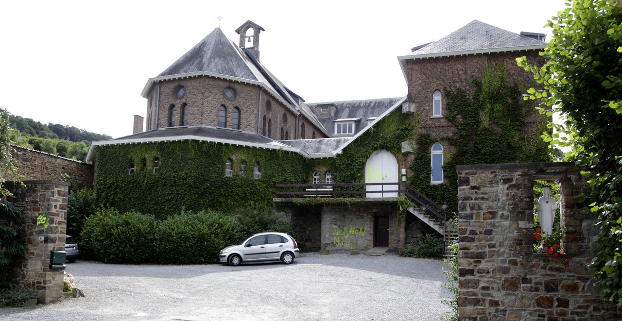 Graffiti is seen sprayed onto the walls of the Poor Clares Monastery in Malonne, Belgium on Wednesday, Aug. 1, 2012. Graffiti was sprayed in reaction to the eventual arrival to the monastery of Michelle Martin, the ex-wife of Belgium's child killer Marc Dutroux - the man responsible for several rapes and deaths in the 1990's. A court on Tuesday ruled in favor of freeing Michelle Martin to live in the monastery. Martin, is halfway through a 30-year jail sentence she received for complicity in the Dutroux case. Graffiti reads in French 'No' and includes the initials M.M. for Michelle Martin. (AP Photo/Virginia Mayo)