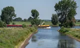 Nederland, Sprang-Capelle, 14 juli 2026. Lage waterstand in de Bergsche Maas. Foto John van Hamond