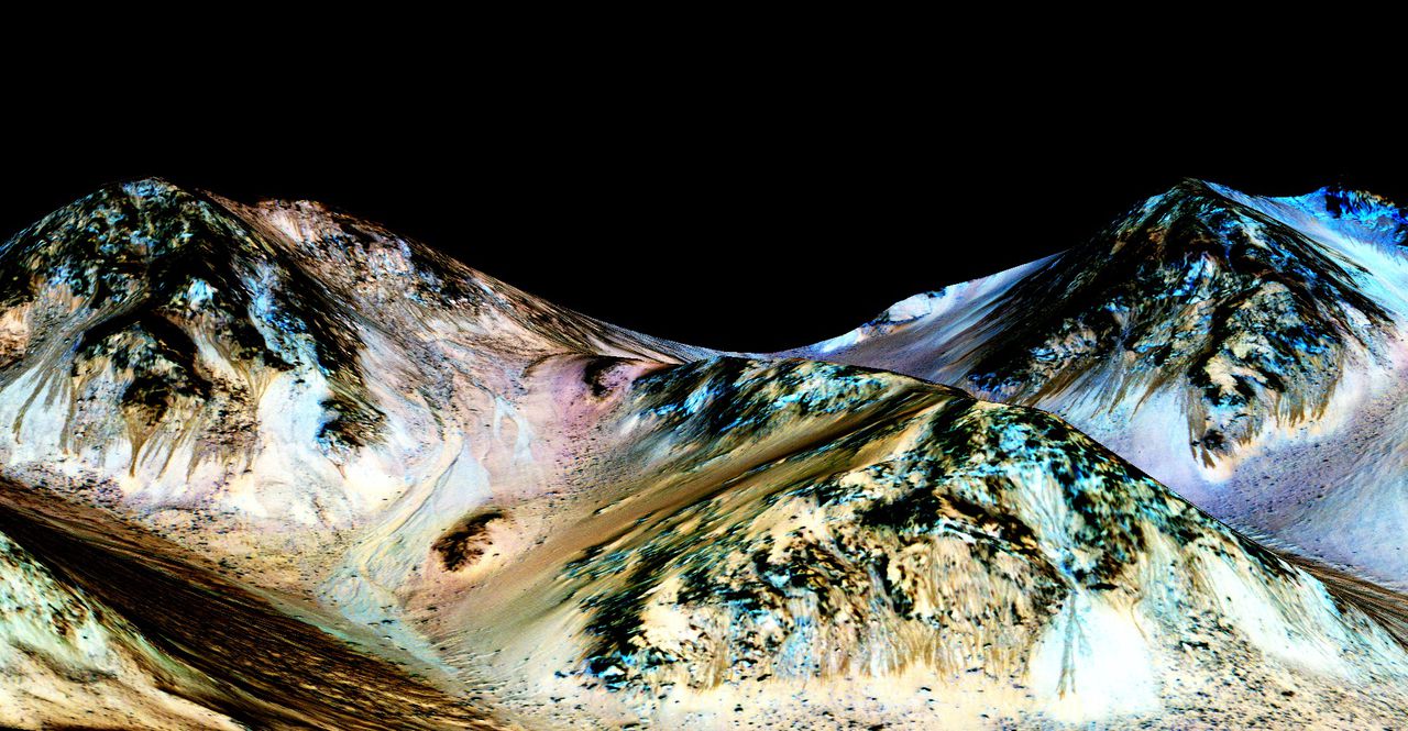 Stroomgeulen langs hellingen op Mars. Al langer werd vermoed dat ze ontstaan door stromend water.