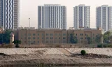 De Amerikaanse ambassade in de Iraakse hoofdstad Baghdad, waar een deel van het personeel geëvacueerd wordt. Foto Murtadha Al-Sudani/ANP/Anadolu 