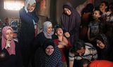 Palestinians mourn during a funeral in Gaza. 