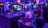 Gamers spelen ‘Crimson Desert’ op Gamescom. Foto Ina Fassbender/ AFP   