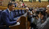 epa12121371 Spanish Prime Minister Pedro Sanchez (L) smiles upon his arrival to attend the weekly Spanish Government's question time session at the Congress of Deputies, in Madrid, Spain, 21 May 2025.  EPA/CHEMA MOYA