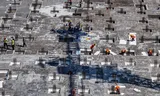 Werknemers op een bouwplaats voor een wooncomplex in Huaian, in de oostelijke provincie Jiangsu. 