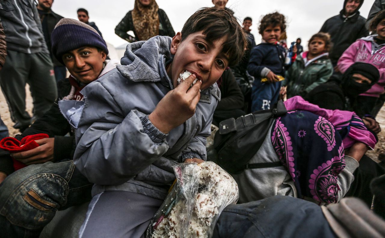 Syrische vluchtelingen in een opvangkamp in Kilis, pal op de Syrische grens. Foto AFP / Bulent Kilic
