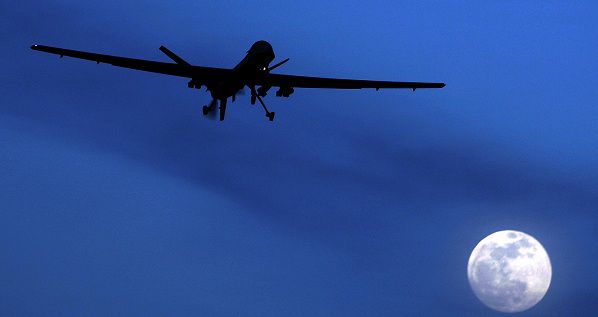 **CORRECTS DATE OF STATEMENT BY EUROPEAN OFFICIALS** FILE - In this Jan. 31, 2010 file photo, a U.S. Predator drone flies over the moon above Kandahar Air Field, southern Afghanistan. European security officials said Wednesday Sept. 29, 2010, a terror plot to wage Mumbai-style shooting sprees or other low-budget attacks in Britain, France and Germany is still active and that sites in Pakistan _ where the threat was intercepted _ are being targeted for al-Qaida operatives. The Obama administration intensified the use of drone-fired missiles in Pakistan's border area, but this month there have been at least 21 attacks _ more than double the highest number fired in any other single month. (AP Photo/Kirsty Wigglesworth, File)