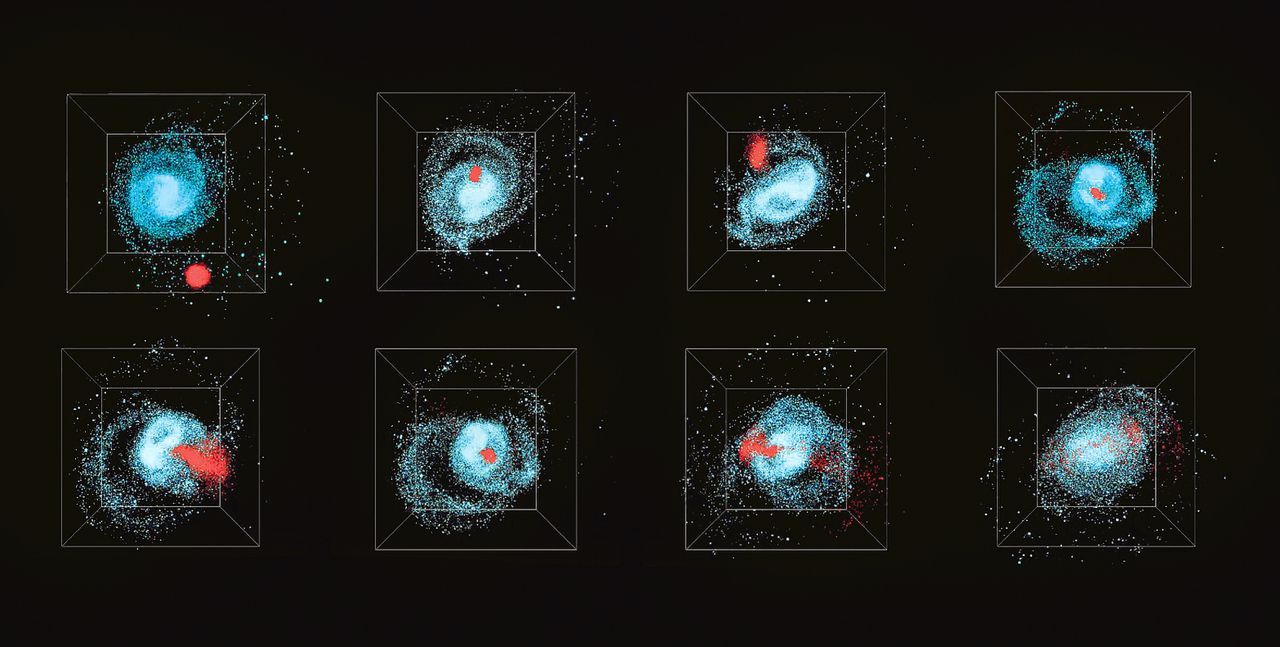 Simulatie van een Melkweg-achtig sterrenstelsel (blauw) dat versmelt met een kleiner sterrenstelsel (rood).
