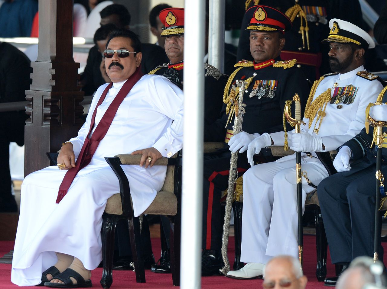 De Sri-Lankese president Mahinda Rajapakse (links) in 2014.