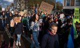 The Climate March parade heads towards Museum Square in Amsterdam.
