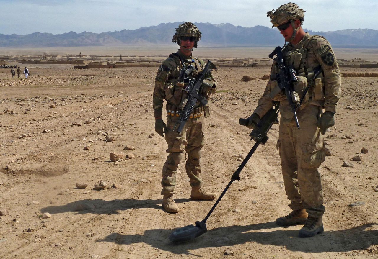 Amerikaanse soldaten in Kandahar, gisteren. Vanochtend vroeg liep een Amerikaan weg van de militaire basis in de Afghaanse provincie om op Afghaanse burgers te schieten.