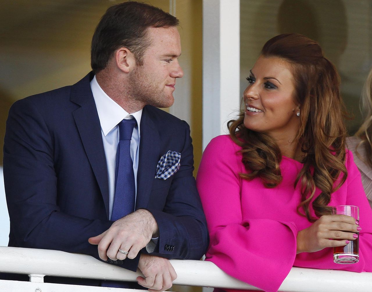 Wayne Rooney en zijn vrouw Coleen, over wie The Sun ongefundeerde roddels publiceerde.