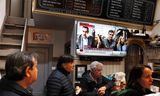 Spanish Prime Minister Pedro Sanchez and his wife Begonia Gomez Fernandez in a news broadcast at a bar in Bilbao, April 25.   