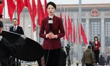 Journalisten aan het werk op het Plein van de Hemelse Vrede bij de opening van het Nationaal Volkscongres, donderdag in Beijing.