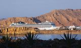 Een cruiseschip in de haven van Sharm-el-Sheikh deze vrijdag. Zondag begint in de Egyptische stad een klimaattop.