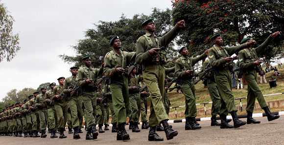 Caption: FILE - In this Tuesday, Aug. 24, 2010 file photo, Kenya Army soldiers rehearse a military parade at Uhuru Park, in Nairobi, Kenya. Kenyan military forces moved into southern Somalia on Sunday, an official and residents said, a day after top Kenyan defence officials said the country has the right to defend itself after a rash of militant kidnappings of Europeans inside Kenya. (AP Photo/Sayyid Azim, File)