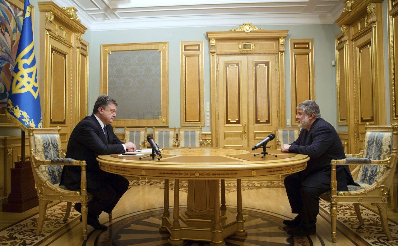 Porosjenko en Kolomosjki in een poging nader tot elkaar te komen.