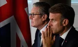 De Britse premier Starmer en Franse president Macron tijdens het driedaagse bezoek van Macron aan het VK deze week. Foto Leon Neal/Reuters 
