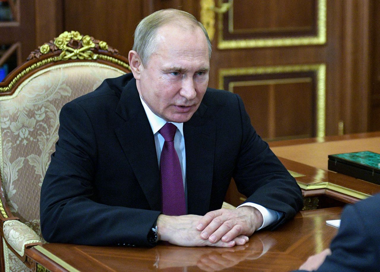 President Vladimir Poetin tijdens een vergadering in het Kremlin.