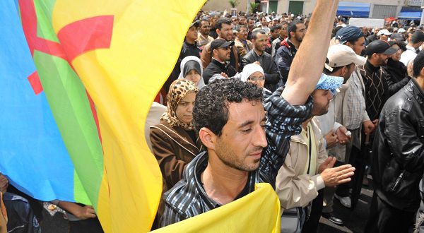 Name: MOROCCO-POLITICS-REF-355971-01-07-20110424-124507.jpg Caption: A Moroccan holding a Berber flag demonstrates in Casablanca on April 24, 2011 to appeal for a more open democratic political system. Even with the recent reforms made by King Mohammed VI and the freeing of political prisoners, reformers want to limit the political powers of the king. AFP APHOTO / ABDELHAK SENNA