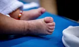A newly born child during a check at the consultation office. As soon as diseases from the vaccination program, the urgency increases, various GGDs find.
