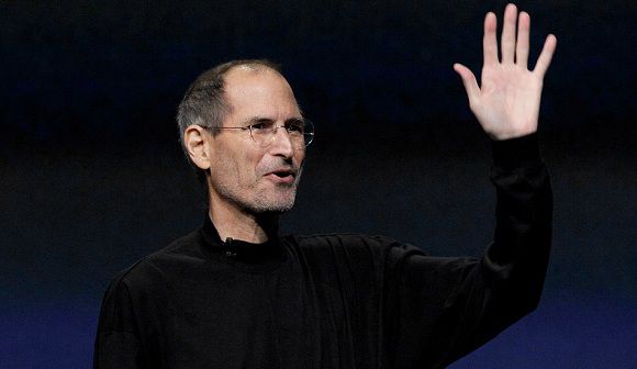 Caption: FILE - In this March 2, 2011 file photo, Apple Inc. Chairman and CEO Steve Jobs waves to his audience at an Apple event at the Yerba Buena Center for the Arts Theater in San Francisco. Apple Inc. on Wednesday, Aug. 24, 2011 said Jobs is resigning as CEO, effective immediately. (AP Photo/Jeff Chiu, File)