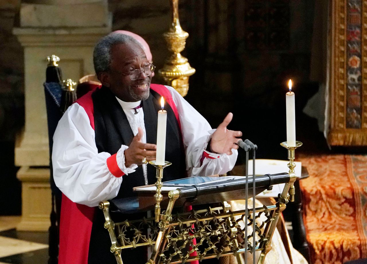 Predikant Michael Curry tijdens de 'royal wedding'. Foto Owen Humphreys/AFP 