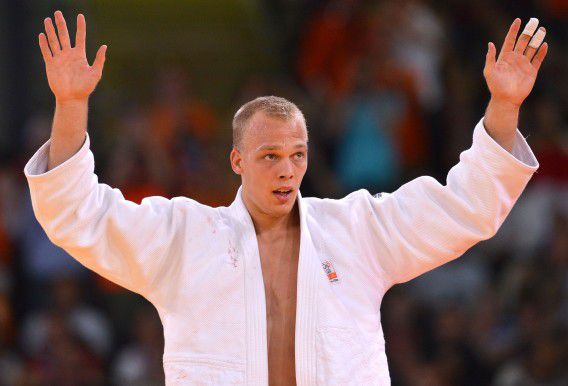 Netherlands' Henk Grol celebrates after winning his men's -100kg judo contest bronze medal match of the London 2012 Olympic Games on August 2, 2012 at the ExCel arena in London. AFP PHOTO / JOHANNES EISELE